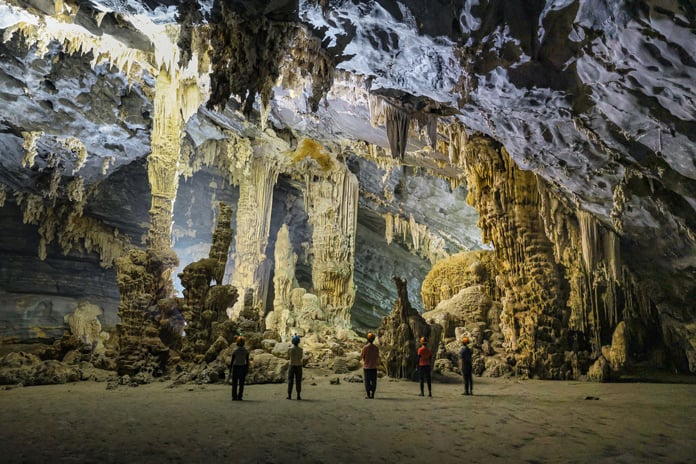 Impressive stalagmites and stalactites can be seen in Tu Lan Cave.